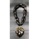 Victorian Scottish tortoiseshell bracelet with yellow metal open work applied padlock clasp, with