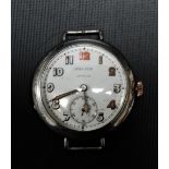 A WWI silver wire lug trench watch with import hallmarks for Birmingham 1918, the 28mm white