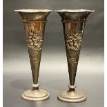 Pair of Edwardian silver spill vases by William Comyns with weighted bases, of trumpet form and