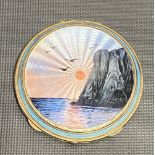 925 silver gilt guilloche coloured enamel compact, the hinged lid with a seascape at sunset with