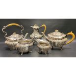 Good Victorian five piece silver tea set by Mappin Brothers, of ovoid lobed section and with foliate