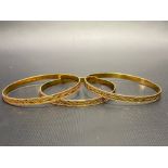 French set of three 18ct gold bangles with eagle head hallmark, diameter 6cm, weight 42.2g approx.