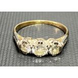 18ct gold and platinum diamond set three stone ring, the centre diamond of 0.25ct spread approx, the