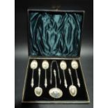 Cased set of eight Victorian silver apostle teaspoons, sifter and sugar tongs, London 1896, weight