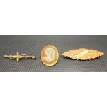 Three gold brooches