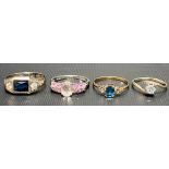 Four 9ct gold stone set rings, weight 8.4g approx.