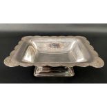 Modern silver rectangular pedestal dish with flower head and engine turned lobed edge, maker