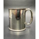 Victorian silver mug of plain form with beaded and reeded rims, engraved monogram and date Feb