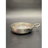 19th Century French silver taste vin with three quarter fluted sides and with twisted circular