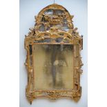 Louis XVI mirror in gilt wood (*) (65x116cm)