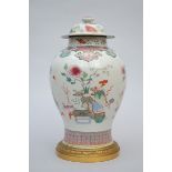 A lidded vase in Chinese famille rose porcelain with bronze base, 18th century (*) (46cm)