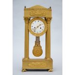 A fire-gilt column-clock signed Costa à Marseille, 19th century (32x68cm)