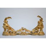 A pair of gilt bronze gilded andirons 'Putti' (130x50cm)