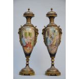 A pair of Sèvres vases with bronze decoration, 20th century (109cm)