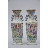 A pair of Chinese octagonal vases in Canton porcelain 'court scenes' (*) (61cm)