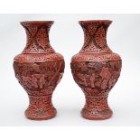 A pair of Chinese vases in red lacquer 'landscapes' (38cm)
