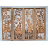 Four sculpted openwork Chinese wooden panels (33x98cm)