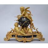 A Napoleon III clock in bronze 'putti' (13x42x36cm)