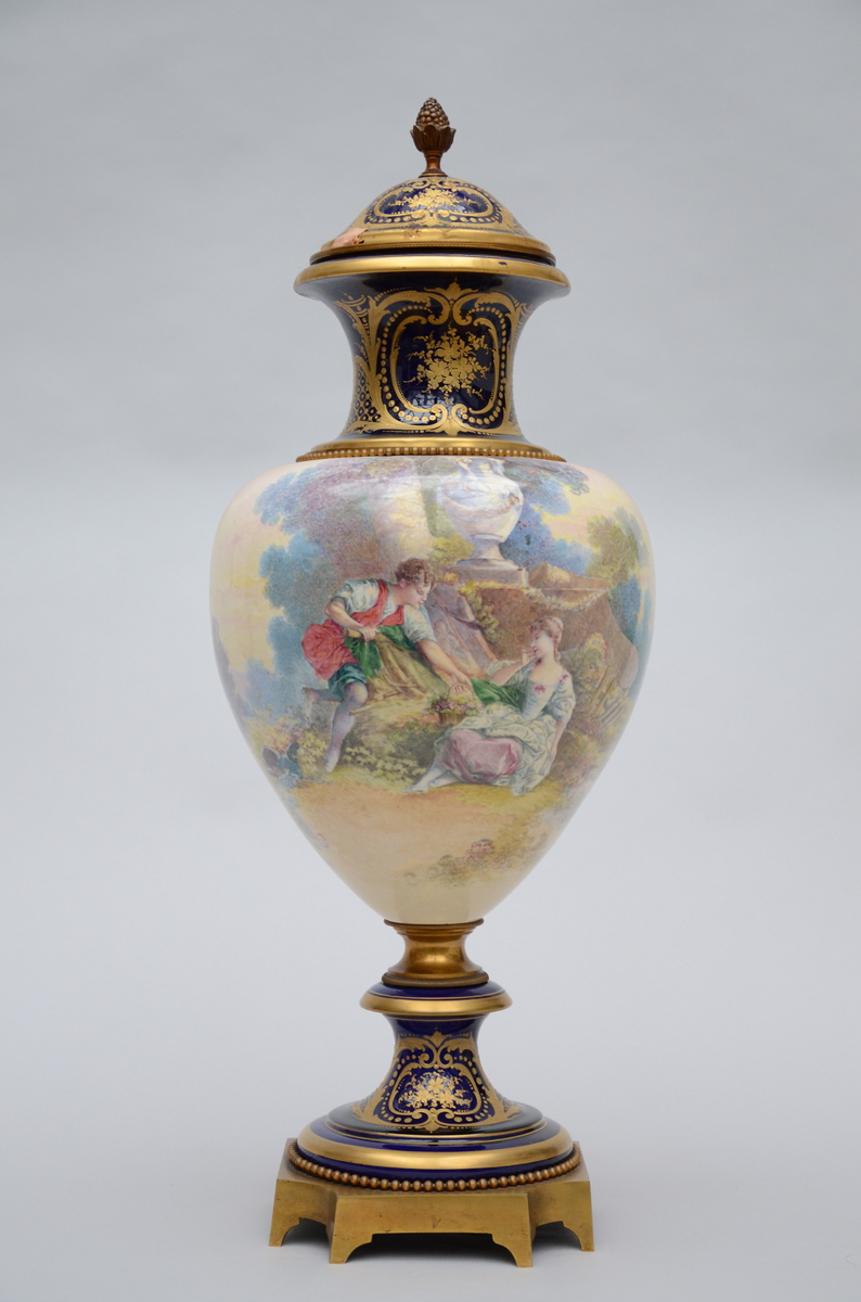 An ornamental vase in Sèvres faience 'romantic scene' (*) (72cm)