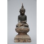 A Burmese Buddha in black lacquer (70cm)