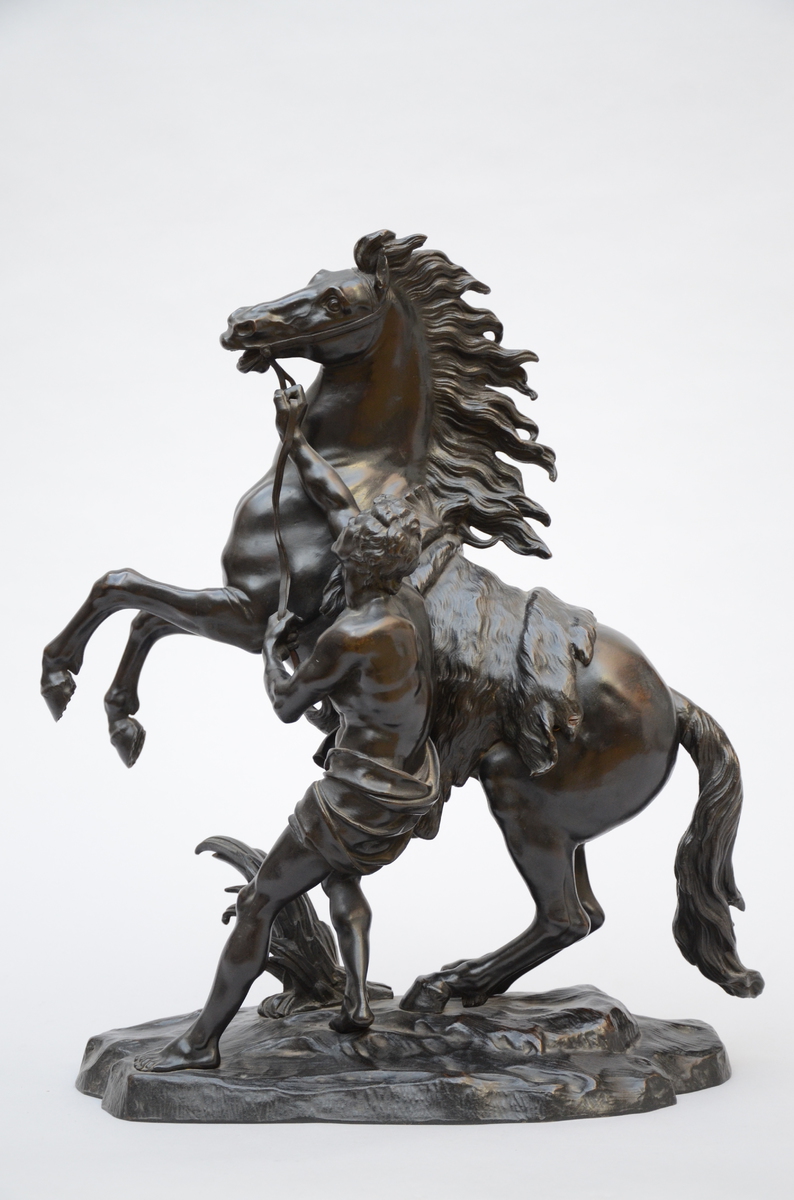 A bronze sculpture 'cheval de Marly' (22x50x60cm)