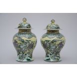 Pair of lidded vases in Chinese famille verte porcelain 'birds and flowers' (*) (37cm)