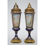 A pair of vases in SËvres porcelain 'ladies and angels' (*) (41cm)