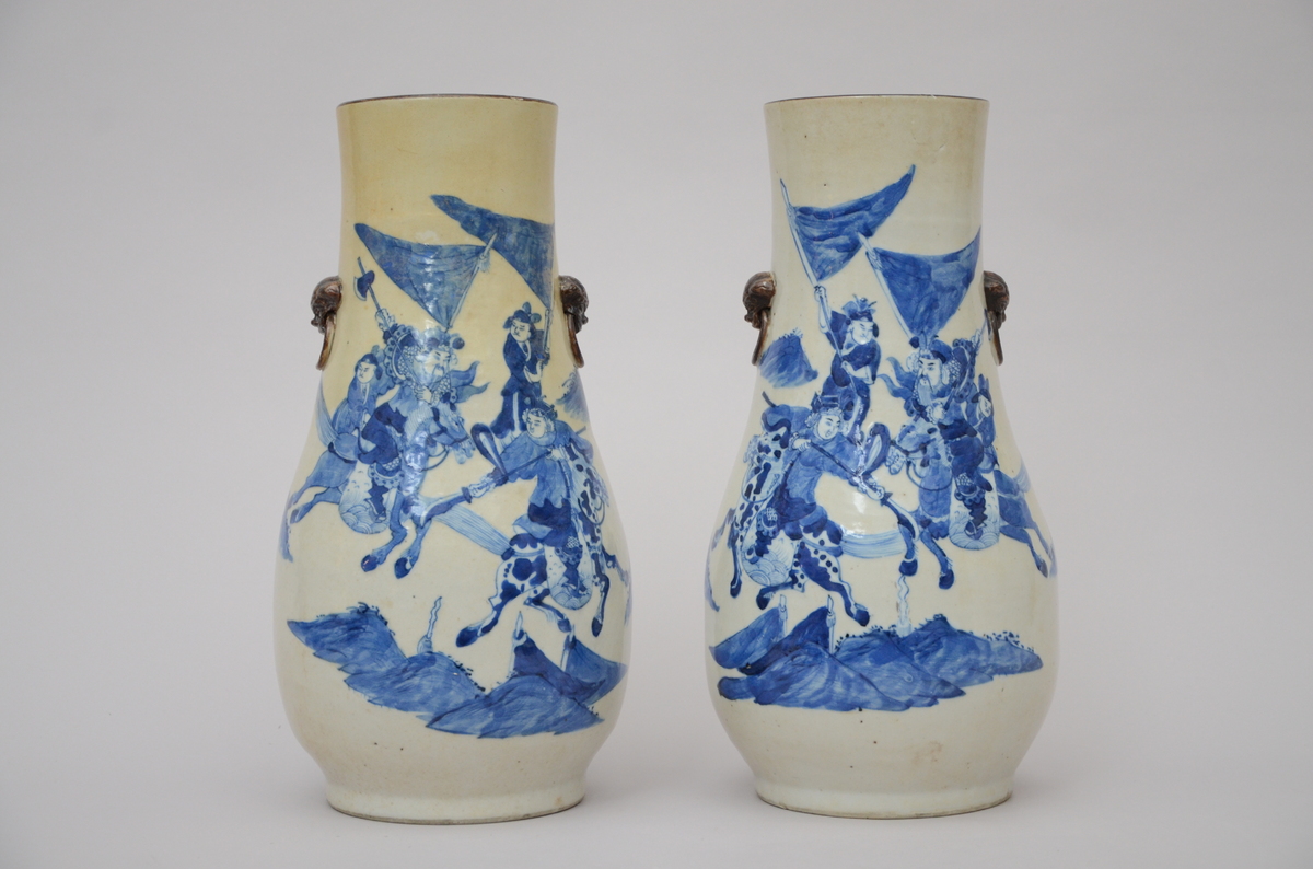 A pair of Nankin vases 'figures' (*) (44cm)