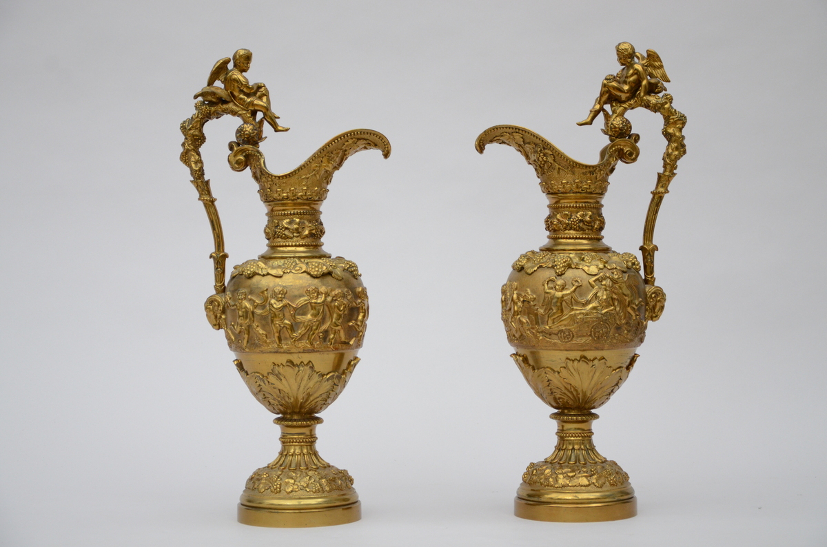 A pair of large bronze ewers 'bacchanal scenes' (58cm)
