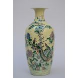 A vase in Chinese porcelain with yellow glaze 'phoenixes' (*) (45cm)