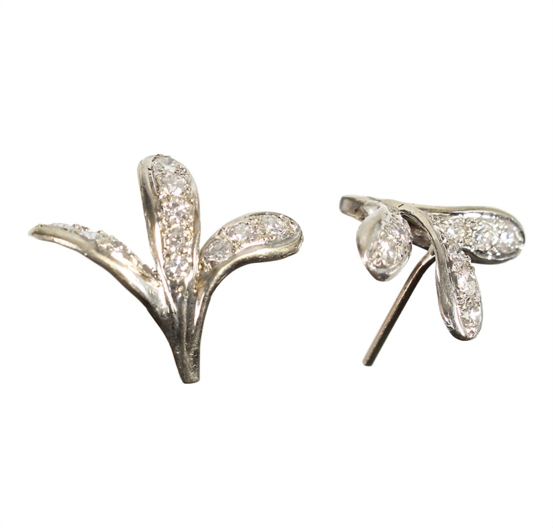 a  pair of studs, white gold 585/000 (checked), 20 brilliants c. 0.80 ct tw-vsi, c. 21.2 x 18.0