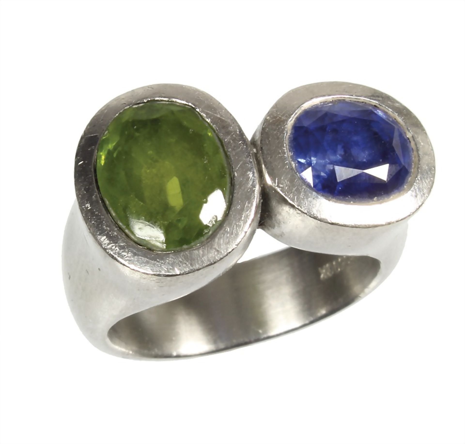 ring, platinum 950/000 signed GK (G. Krauss Stuttgart), 1 peridot c. 3.0 ct (10 x 8 mm, faceted),