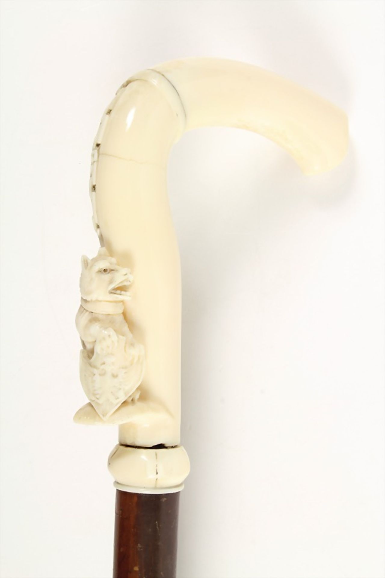 stick form the  middle of the  19th century, ivory handle: sitting wolf (chained), at his feet a - Bild 2 aus 3