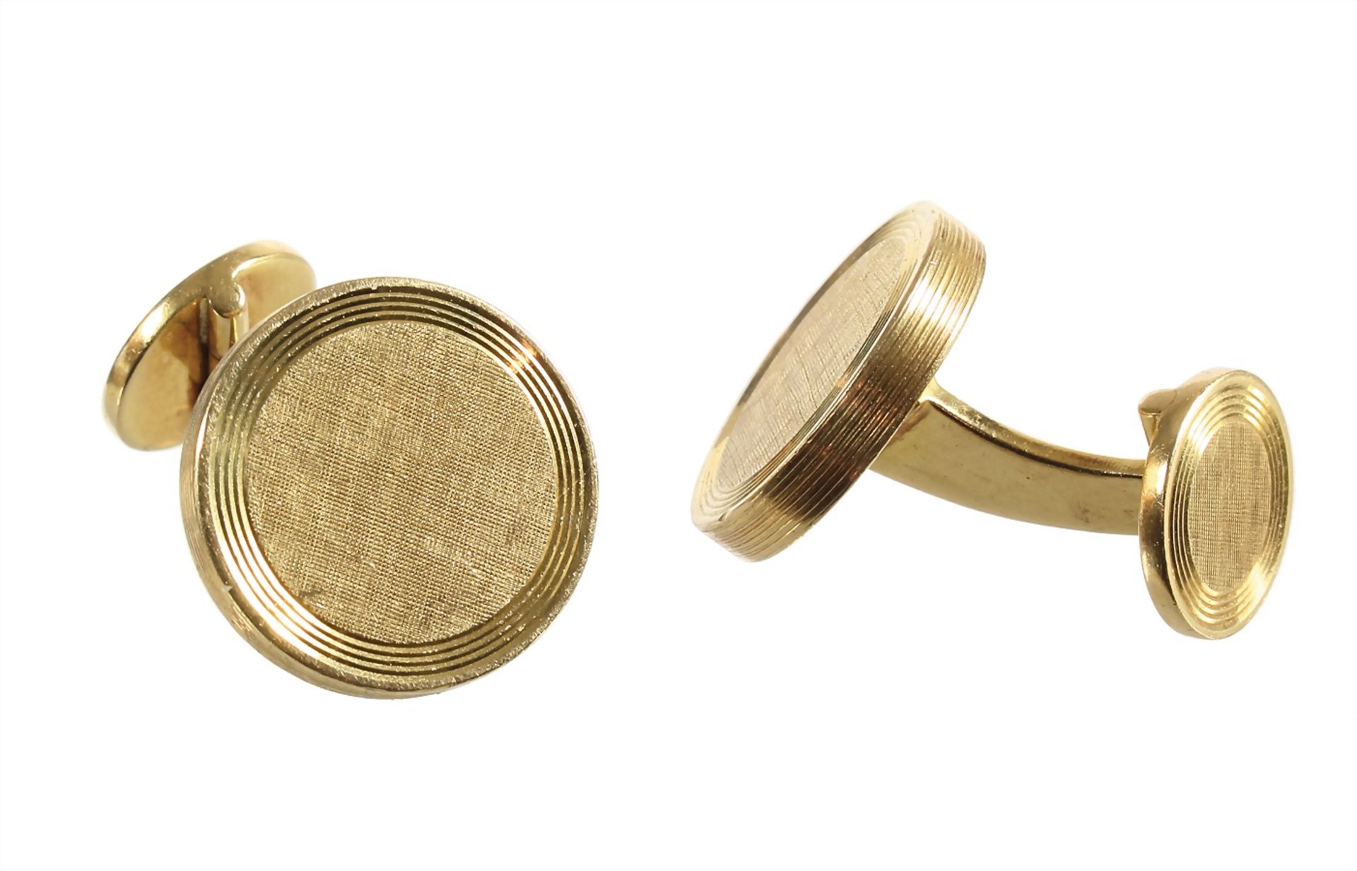 a pair cufflinks, yelow gold 750/000, fine grooved surface with circle ornament, diameter = 18.0 mm,