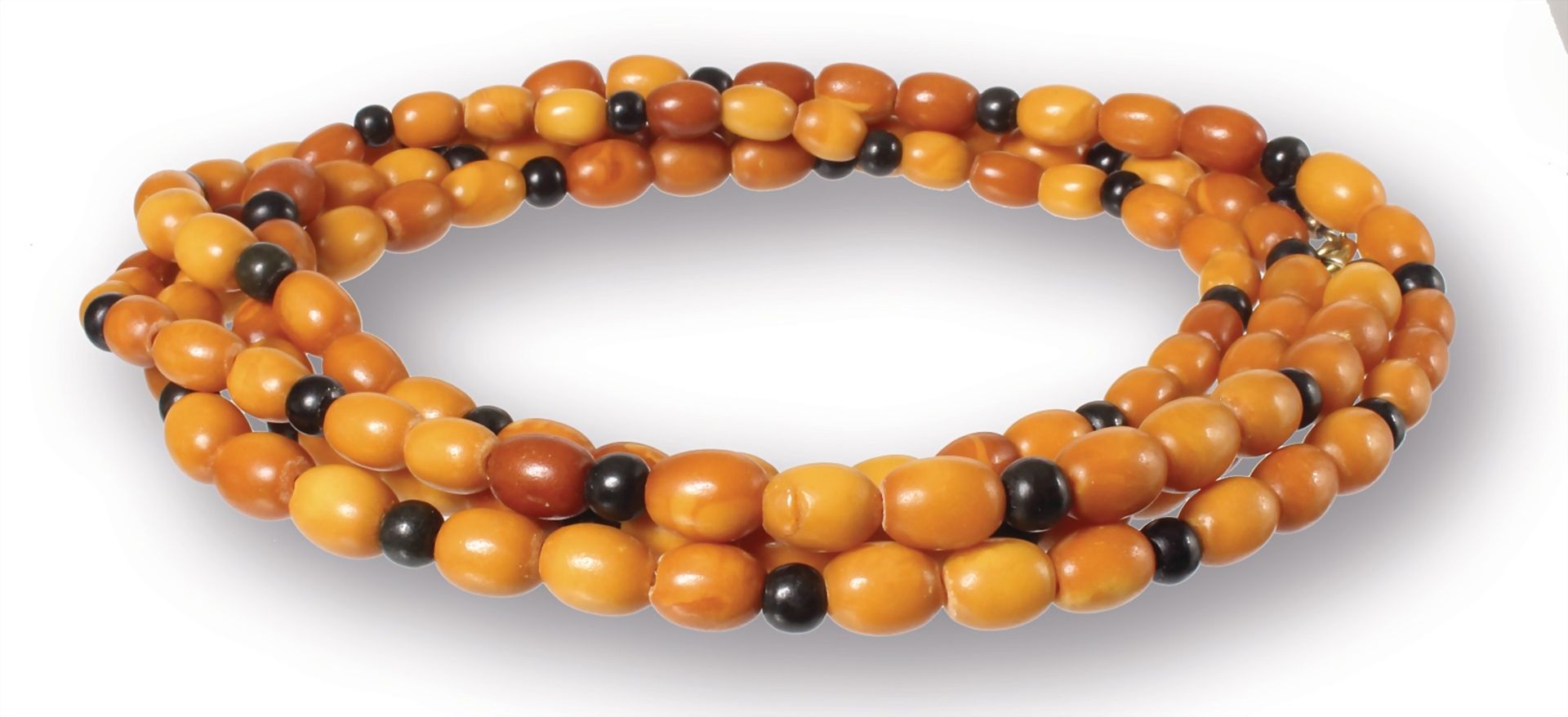 chain, amber "BUTTERSCOTCH", olives diameter = 6.5-7.5 mm, some black pearls between , lenght =