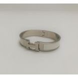 HERMES PARIS - BRACELET CLIC H en métal palladié et laque blanche, PM, poignée. [...]