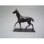 Edgar DEGAS (1834-1917), D'Après - Cheval marchant au pas relevé - Bronze à [...]