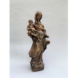 VIERGE à l'Enfant en bois sculpté en ronde-bosse. - XVIIIe siècle. - Haut. : 53 cm -