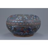 A large Chinese Qing dynasty cloisonné enamel box and cover decorated with lions and blue interior.