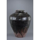 A large Chinese Song Dynasty Glazed Martaban Jar (Ex. Sotheby's). The jar is made from a reddish sto