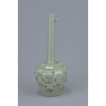 Korean Celadon long neck Bottle Vase with floral pattern decoration, 16cms high