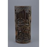 A Chinese 19/20th century carved bamboo brush pot. Carved with figures. 30.5cm height