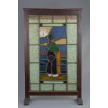 An English 19/20th century stained glass fire screen in wooden stand on two feet. 53cm x 86cm