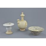 A group of three Chinese Song dynasty white glazed pottery items. To include a water bottle, an oil