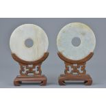 Pair of Chinese Jade Discs on Wooden Stands, 12cms high (2)