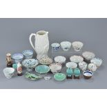 A large quantity mainly Chinese porcelain 18/19th century tea cups and miniature vases with other po