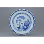 A large 18th century Chinese blue and white porcelain dish decorated with willow tree. 35cm diameter