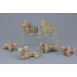 A group of six miniature painted pottery animal figures. Sizes approx. 9cm to 10cm length (6)