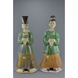 Pair of Ming style Green and Amber Glazed Figures of a Man and a Lady with separate heads. 66cms hig