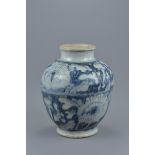 A Chinese Ming dynasty blue and white porcelain jar. 23cm tall